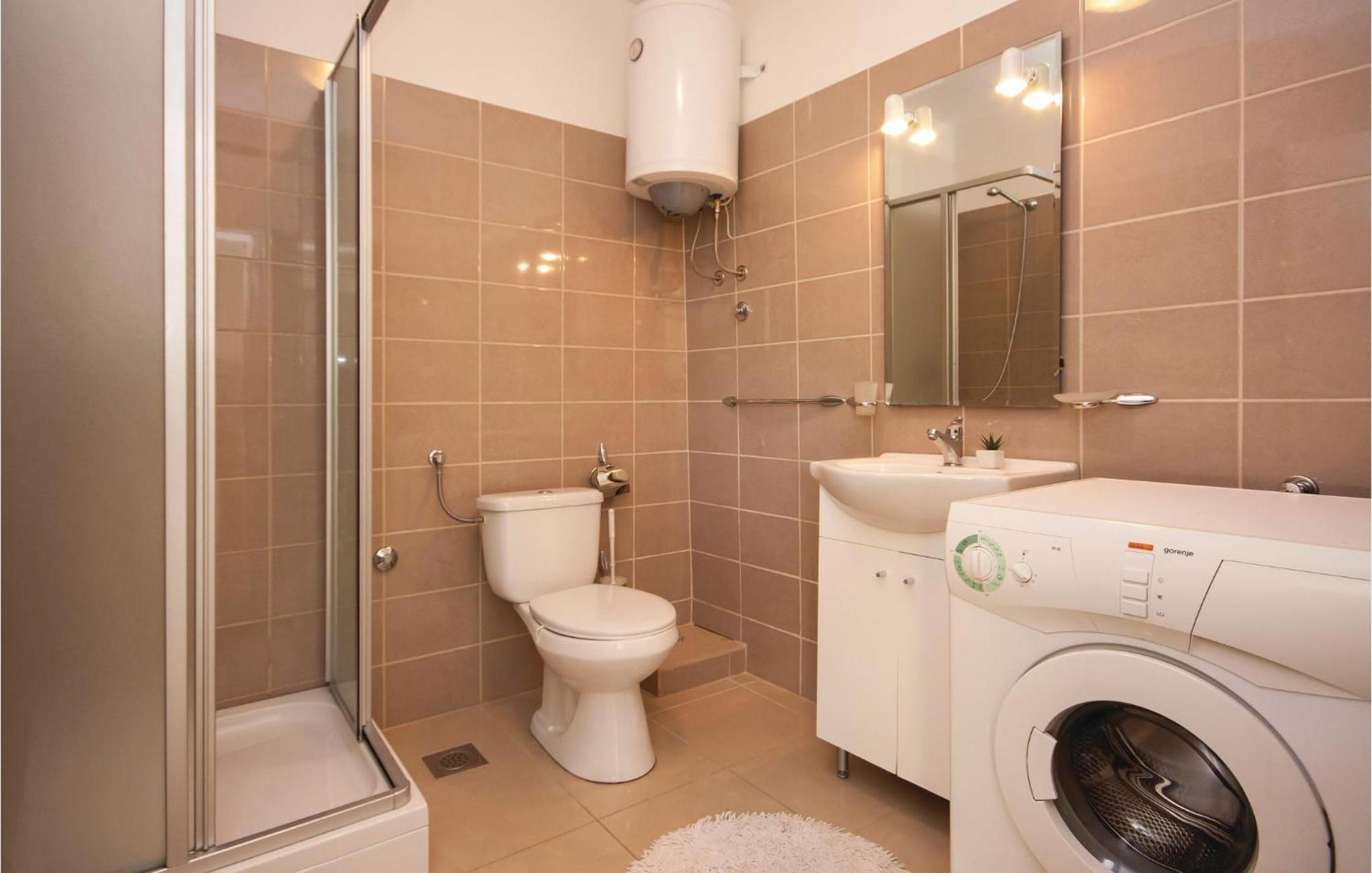 Nice Apartment In Raslina With House Sea View Eksteriør billede