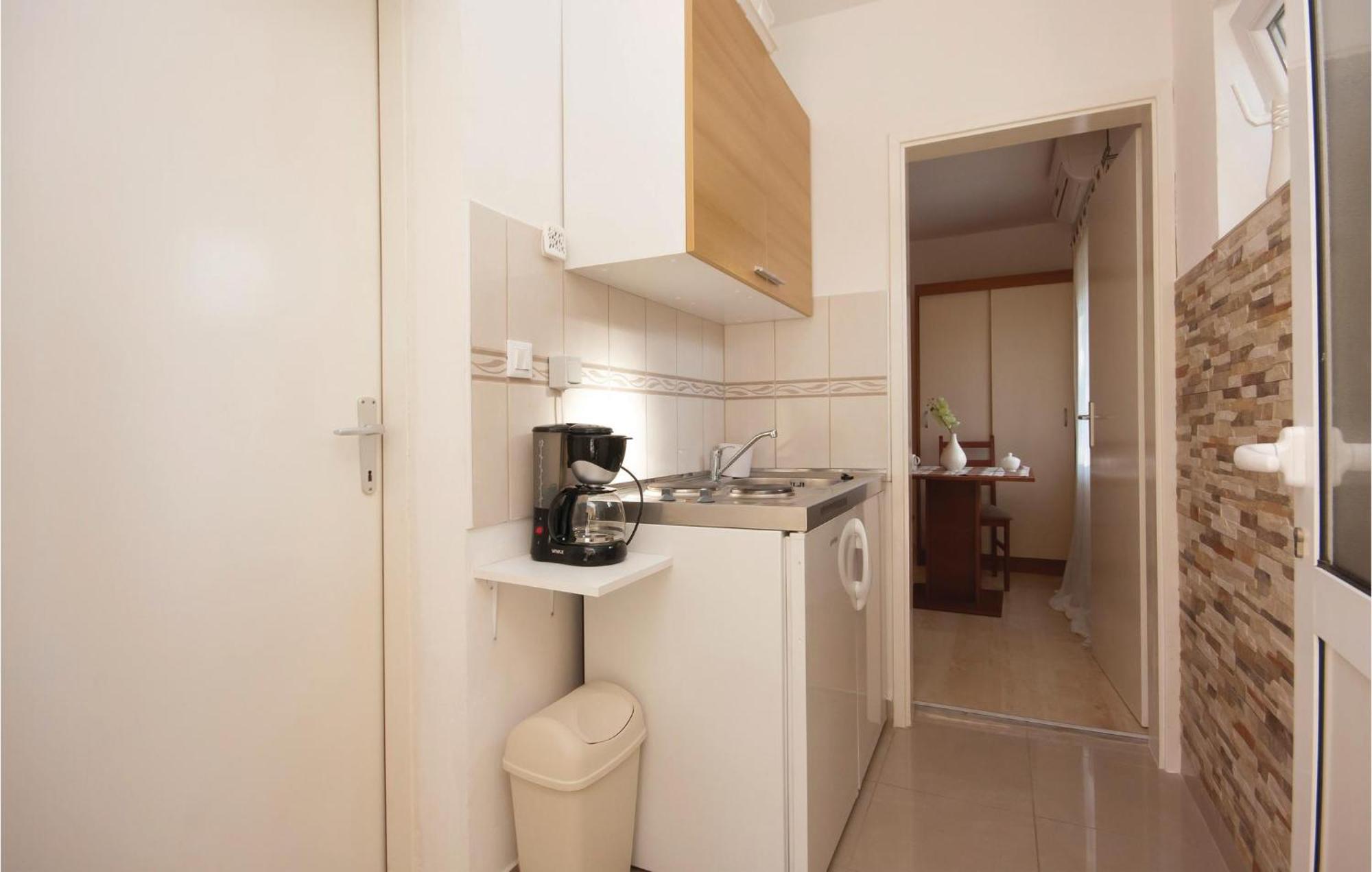 Nice Apartment In Raslina With House Sea View Eksteriør billede