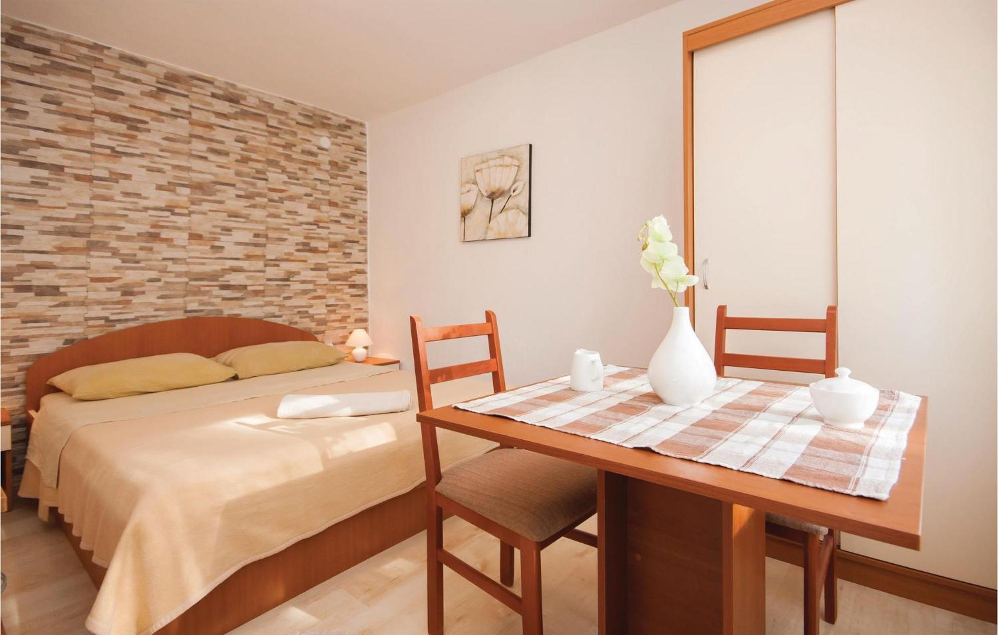 Nice Apartment In Raslina With House Sea View Eksteriør billede