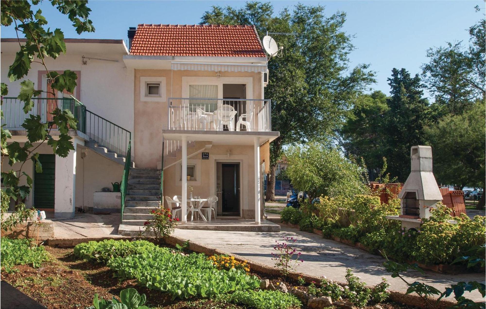 Nice Apartment In Raslina With House Sea View Eksteriør billede